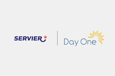 Servier and Day One Biopharmaceuticals company logos side-by-side representing their roughly $2.5 billion acquisition deal.